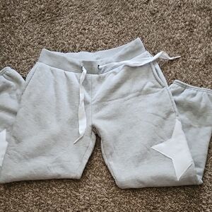 No Boundaries Light Gray Joggers with White Star Accents.  Has Pockets.